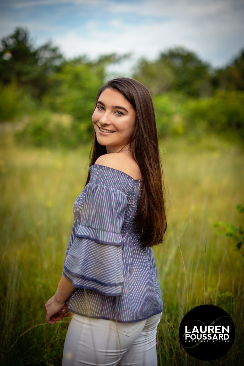 Fields are lovely backdrops for senior pictures. This in is in Gloucester MA